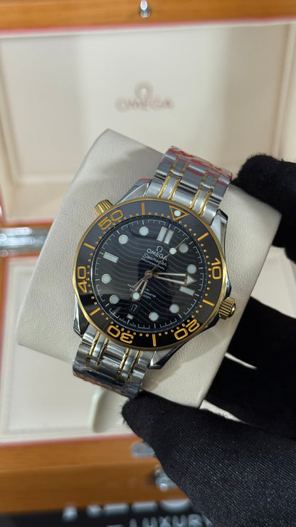 OMG SEAMASTER (PLATA/ORO/NEGRO)