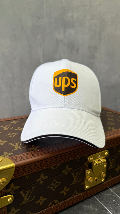 GORRA U P S BLANCO