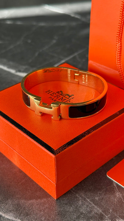 PULSERA HRMS NEGRO/ ORO