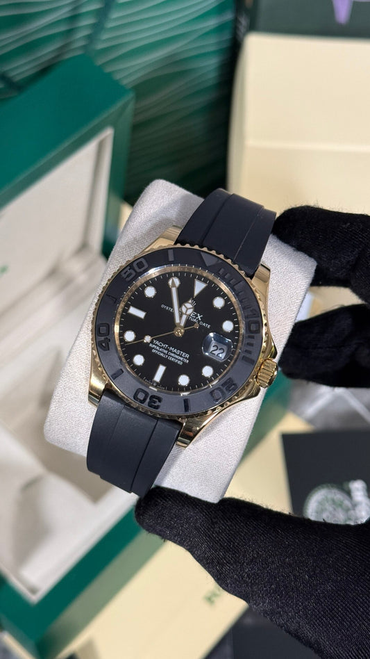 RLX YACHT-MASTER (ORO/NEGRO) GOMA