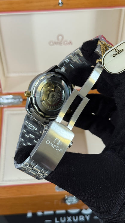 OMG SEAMASTER (PLATA/ORO/NEGRO)