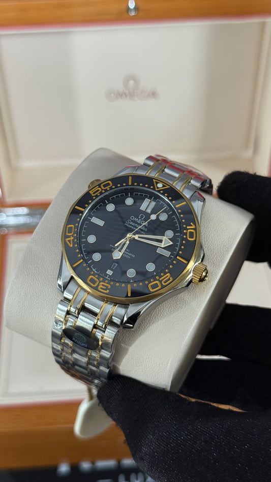 OMG SEAMASTER (PLATA/ORO/NEGRO)